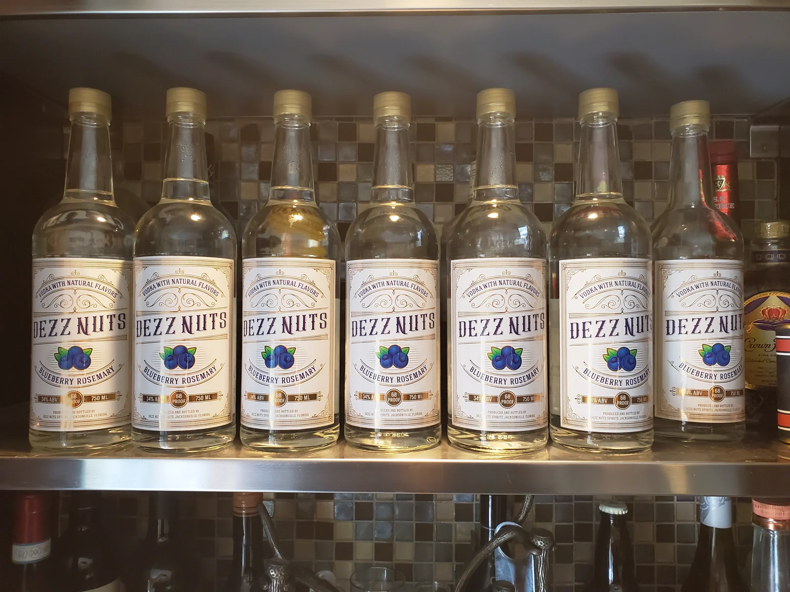 Dezz Nuts craft spirits collection on the distillery shelf